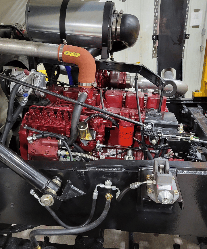 Closeup image of a yard spotter truck's engine. Renew Truck in New Boston, TX remanufactures and repairs yard spotter trucks.