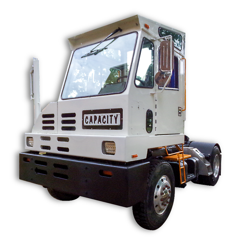 Closeup image of a white Capacity spotter truck. It's a truck brand we service at Renew Truck in New Boston, TX.