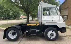 Should You Buy a New or Used Yard Truck? | Renew Truck in Boston, TX. Side-view image of a white used yard truck.