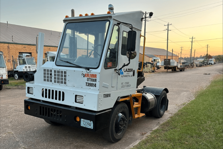yard truck dealer, spotter truck repair in New Boston, TX at Renew Truck. Kalmar Ottawa yard truck parked on a street at sunset.