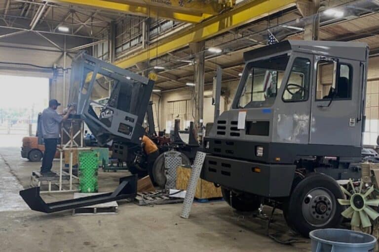Yard Truck Rebuild in New Boston TX At ReNew Truck. Mechanic working on a yard spotter truck in a professional repair shop