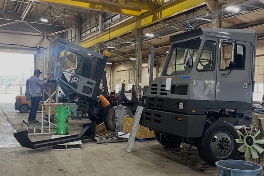 Yard Truck Rebuild in New Boston TX At ReNew Truck. Mechanic working on a yard spotter truck in a professional repair shop